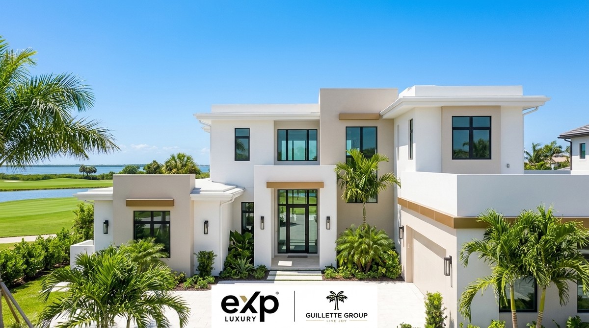 Modern white luxury home with palm trees, a golf course, and ocean view, ideal for downsizing real estate strategies.
